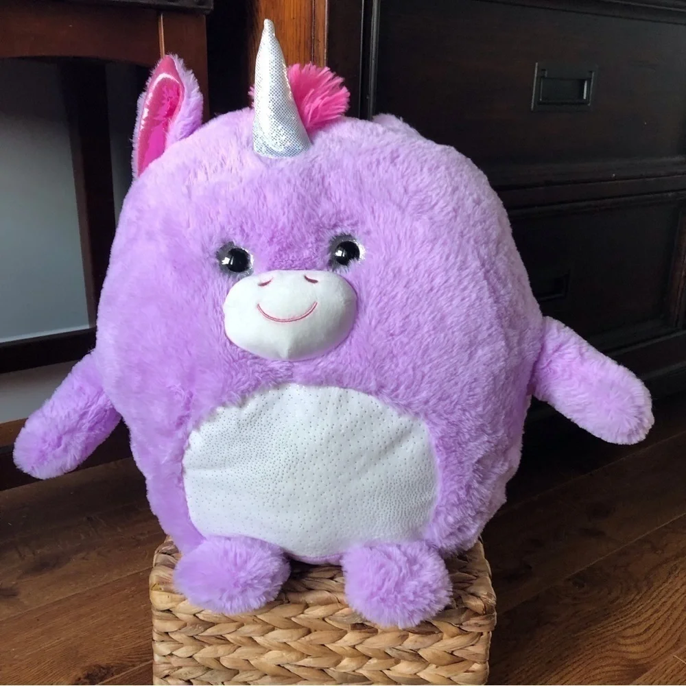 Purple light up unicorn stuffed animal